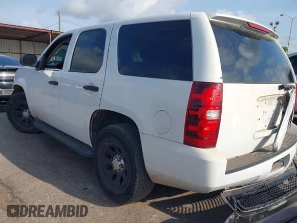2013 Chevrolet Tahoe Commercial with VIN 1GNLC2E06DR273218, listed as a IAAI auction lot 42459013 with 181,495 mi miles and . Bid and sale history available at DreamBid. Image 3.