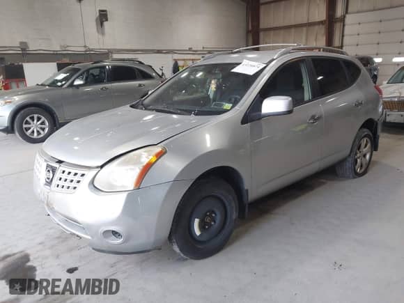 2010 Nissan Rogue S with VIN JN8AS5MV2AW112755, listed as a IAAI auction lot 43276874 with 230,663 mi miles and . Bid and sale history available at DreamBid. Image 2.