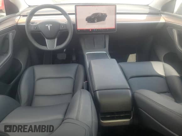 2023 Tesla Model Y with VIN 7SAYGDED6PF960648, listed as a Copart auction lot 67447254 with 18,536 mi miles and Salvage title. Bid and sale history available at DreamBid. Image 8.