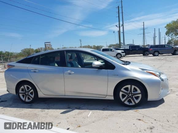 2017 Toyota Prius Two z VIN JTDKARFU7H3047752, wystawiony jako IAAI lot #41706089 z przebiegiem 45 391 mil mil oraz . Historia ofert i sprzedaży dostępna na DreamBid. Obrazek 13.