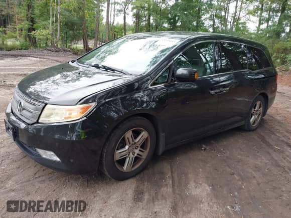 2012 Honda Odyssey Touring с VIN 5FNRL5H98CB146036, выставлен на аукционе IAAI как лот 43335043 с пробегом 178 401 миль миль и . История ставок и продаж доступна на DreamBid. Изображение 17.