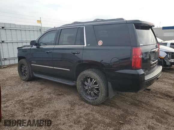 2015 Chevrolet Tahoe LT с VIN 1GNSKBKC9FR736808, выставлен на аукционе Copart как лот 82057335 с пробегом 165 828 миль миль и Списание • Salvage title. История ставок и продаж доступна на DreamBid. Изображение 2.