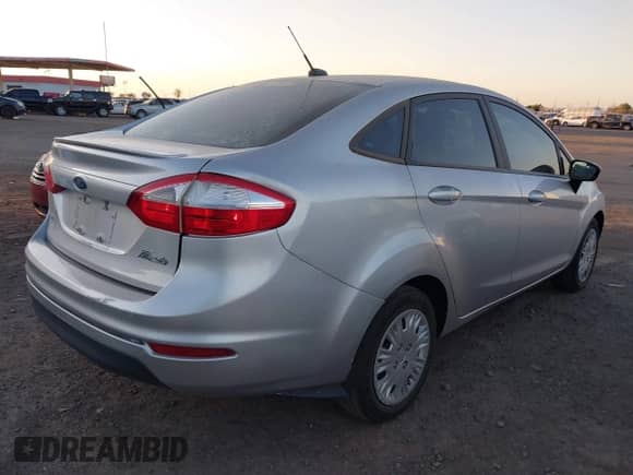 2018 Ford Fiesta S with VIN 3FADP4AJ3JM120312, listed as a IAAI auction lot 42575364 with 80,034 mi miles and . Bid and sale history available at DreamBid. Image 4.