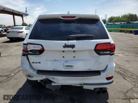 2018 Jeep Grand Cherokee High Altitude with VIN 1C4RJFCT9JC293653, listed as a Copart auction lot 58833145 with 96,808 mi miles and Salvage title. Bid and sale history available at DreamBid. Image 6.