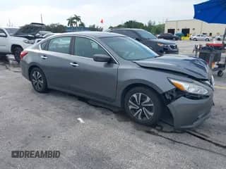 2016 Nissan Altima S with VIN 1N4AL3AP3GC242353, listed as a IAAI auction lot 43126215 with 129,494 mi miles and . Bid and sale history available at DreamBid. Image 1.