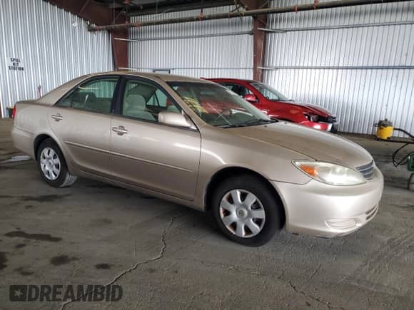 2002 Toyota Camry LE с VIN 4T1BE32K32U005811, выставлен на аукционе Copart как лот 70229945 с пробегом 209 472 миль миль и Чистый • Clean title. История ставок и продаж доступна на DreamBid. Изображение 4.