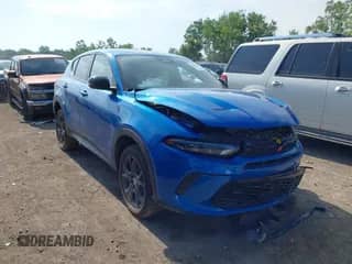 2024 Dodge Hornet GT with VIN ZACNDFAN3R3A36707, listed as a IAAI auction lot 42709379 with 1,960 mi miles and . Bid and sale history available at DreamBid. Image 1.