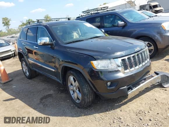 2011 Jeep Grand Cherokee Overland Summit with VIN 1J4RR6GT8BC607467, listed as a IAAI auction lot 43211985 with 95,081 mi miles and . Bid and sale history available at DreamBid. Image 1.
