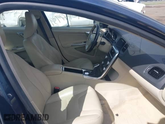 2015 Volvo S60 T5 Drive-E Premier with VIN YV140MFK9F1353755, listed as a IAAI auction lot 42947939 with 84,531 mi miles and . Bid and sale history available at DreamBid. Image 5.