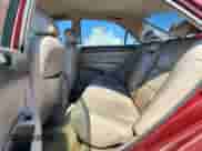 2002 Toyota Camry LE z VIN 4T1BE30K82U082841, wystawiony jako Copart lot #80754015 z przebiegiem 192 738 mil mil oraz Szkoda całkowita • Salvage title. Historia ofert i sprzedaży dostępna na DreamBid. Obrazek 10.