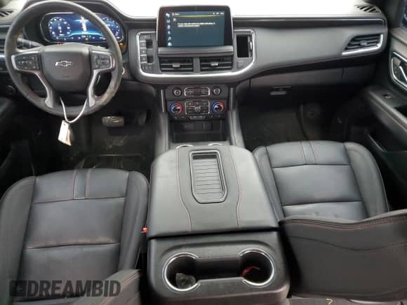 2023 Chevrolet Suburban RST с VIN 1GNSKEKD5PR354447, выставлен на аукционе Copart как лот 45123445 с пробегом 19 521 миль миль и Списание • Salvage title. История ставок и продаж доступна на DreamBid. Изображение 8.