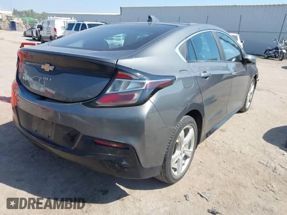 2017 Chevrolet Volt LT z VIN 1G1RA6S53HU178322, wystawiony jako IAAI lot #43347517 z przebiegiem 117 688 mil mil oraz . Historia ofert i sprzedaży dostępna na DreamBid. Obrazek 4.