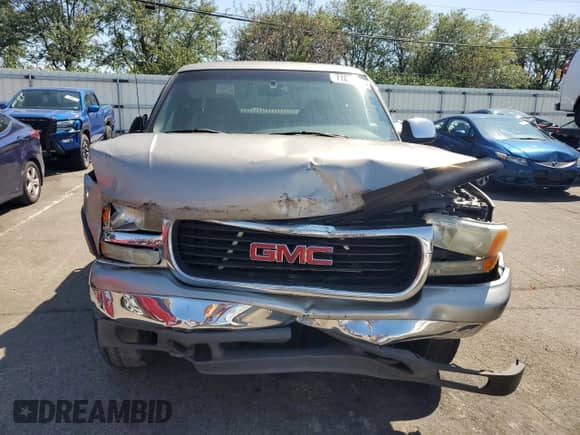 2002 GMC Sierra 1500 SLE with VIN 1GTEK19T02E203754, listed as a Copart auction lot 71672985 with 188,596 mi miles and Salvage title. Bid and sale history available at DreamBid. Image 5.