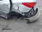 2014 Hyundai Santa Fe with VIN 5XYZU3LA2EG173067, listed as a IAAI auction lot 43309222 with 136,499 mi miles and . Bid and sale history available at DreamBid. Image 6.