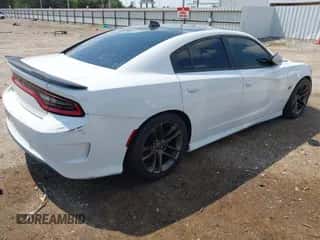 2018 Dodge Charger R/T Scat Pack with VIN 2C3CDXGJ7JH306977, listed as a IAAI auction lot 42928058 with 72,565 mi miles and . Bid and sale history available at DreamBid. Image 4.