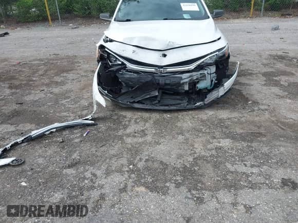 2023 Chevrolet Malibu LS z VIN 1G1ZB5ST5PF238254, wystawiony jako IAAI lot #42430499 z przebiegiem 21 508 mil mil oraz . Historia ofert i sprzedaży dostępna na DreamBid. Obrazek 6.