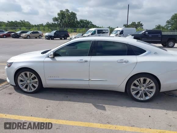 2016 Chevrolet Impala LTZ with VIN 2G1145S33G9199454, listed as a IAAI auction lot 42755860 with 96,410 mi miles and . Bid and sale history available at DreamBid. Image 14.