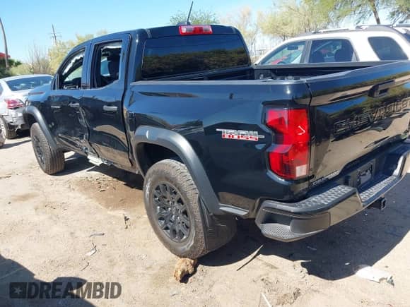 2023 Chevrolet Colorado 4WD Trail Boss with VIN 1GCPTEEK8P1126284, listed as a IAAI auction lot 42397525 with 15,917 mi miles and . Bid and sale history available at DreamBid. Image 3.