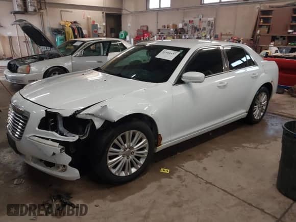 2013 Chrysler 300 with VIN 2C3CCARG6DH505220, listed as a IAAI auction lot 41944437 with 196,548 mi miles and . Bid and sale history available at DreamBid. Image 17.