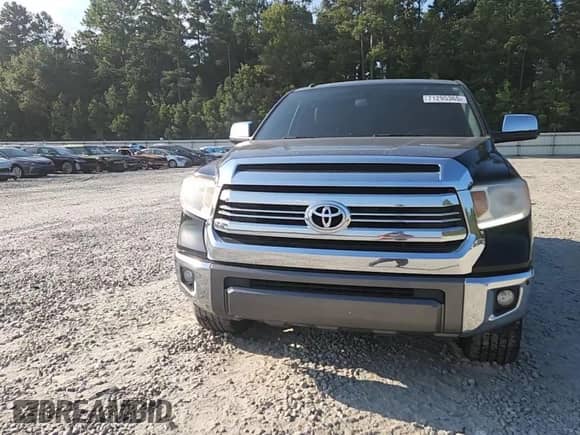 2016 Toyota Tundra Platinum with VIN 5TFGW5F16GX208427, listed as a Copart auction lot 71295365 with 150,184 mi miles and Salvage title. Bid and sale history available at DreamBid. Image 13.