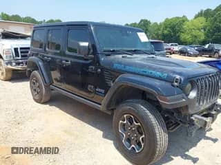 2022 Jeep Wrangler Unlimited Rubicon с VIN 1C4JJXR62NW173198, выставлен на аукционе IAAI как лот 42564940 с пробегом 57 001 миль миль и . История ставок и продаж доступна на DreamBid. Изображение 1.