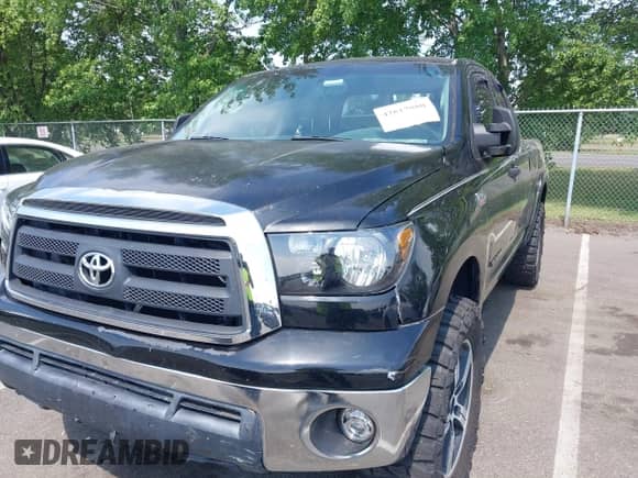 2012 Toyota Tundra z VIN 5TFRY5F10CX117652, wystawiony jako IAAI lot #42617080 z przebiegiem 233 560 mil mil oraz . Historia ofert i sprzedaży dostępna na DreamBid. Obrazek 6.