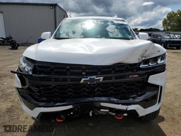 2024 Chevrolet Suburban Z71 с VIN 1GNSKDKD1RR217213, выставлен на аукционе Copart как лот 70671255 с пробегом 14 845 миль миль и Списание • Salvage title. История ставок и продаж доступна на DreamBid. Изображение 5.