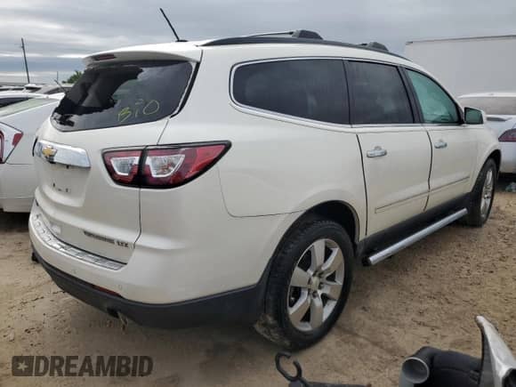 2015 Chevrolet Traverse LTZ с VIN 1GNKRJKD0FJ205512, выставлен на аукционе Copart как лот 74924384 с пробегом Не указан миль и На запчасти • Non repairable. История ставок и продаж доступна на DreamBid. Изображение 3.