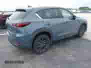 2023 Mazda CX-5 S Carbon Edition z VIN JM3KFBCM1P0132803, wystawiony jako IAAI lot #43128566 z przebiegiem 37 967 mil mil oraz . Historia ofert i sprzedaży dostępna na DreamBid. Obrazek 4.