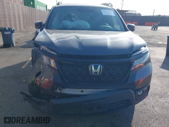 2019 Honda Passport Touring with VIN 5FNYF7H90KB006205, listed as a IAAI auction lot 43291429 with Not provided miles and . Bid and sale history available at DreamBid. Image 12.