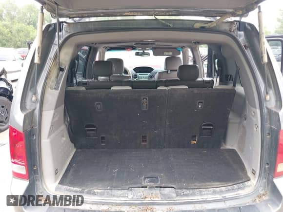 2009 Honda Pilot Touring with VIN 5FNYF48969B031280, listed as a IAAI auction lot 42934690 with 163,844 mi miles and . Bid and sale history available at DreamBid. Image 12.