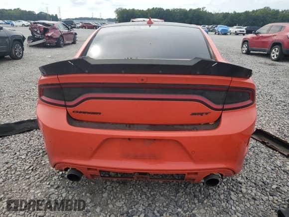 2019 Dodge Charger Scat Pack с VIN 2C3CDXGJXKH558479, выставлен на аукционе Copart как лот 82067615 с пробегом 106 250 миль миль и Списание • Salvage title. История ставок и продаж доступна на DreamBid. Изображение 6.