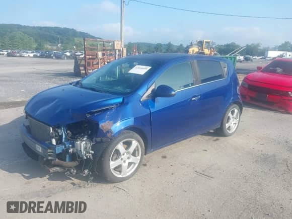 2014 Chevrolet Sonic LTZ with VIN 1G1JE6SB3E4200225, listed as a IAAI auction lot 42840609 with 104,410 mi miles and . Bid and sale history available at DreamBid. Image 2.