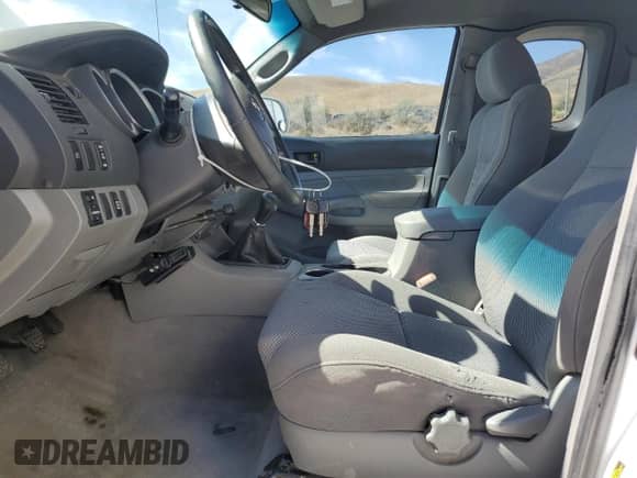 2005 Toyota Tacoma с VIN 5TEUU42N25Z144596, выставлен на аукционе Copart как лот 69295985 с пробегом 285 923 миль миль и Списание • Salvage title. История ставок и продаж доступна на DreamBid. Изображение 7.