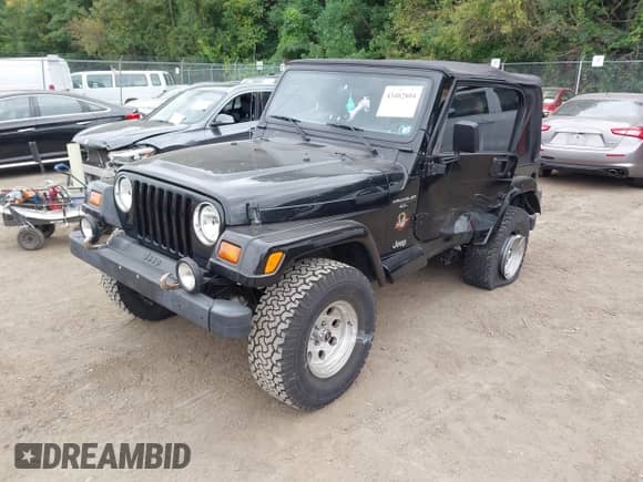 1999 Jeep Wrangler Sahara с VIN 1J4FY49S4XP469005, выставлен на аукционе IAAI как лот 43402804 с пробегом 88 432 миль миль и . История ставок и продаж доступна на DreamBid. Изображение 2.