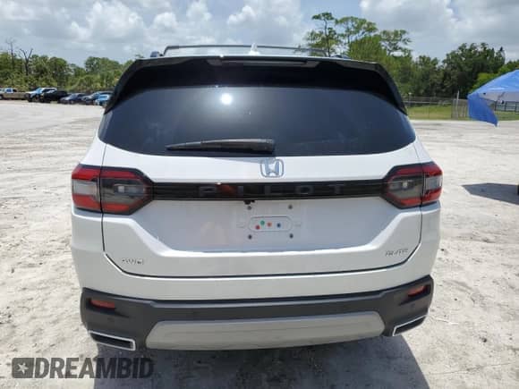 2023 Honda Pilot Elite с VIN 5FNYG1H80PB009677, выставлен на аукционе Copart как лот 62694475 с пробегом 33 436 миль миль и Списание • Salvage title. История ставок и продаж доступна на DreamBid. Изображение 6.