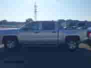 2014 Chevrolet Silverado 1500 LT with VIN 3GCPCREHXEG259073, listed as a IAAI auction lot 43010013 with 128,000 mi miles and . Bid and sale history available at DreamBid. Image 14.