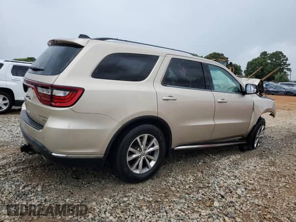 2014 Dodge Durango Limited with VIN 1C4RDHDG8EC443410, listed as a Copart auction lot 61386365 with 115,570 mi miles and Salvage title. Bid and sale history available at DreamBid. Image 3.
