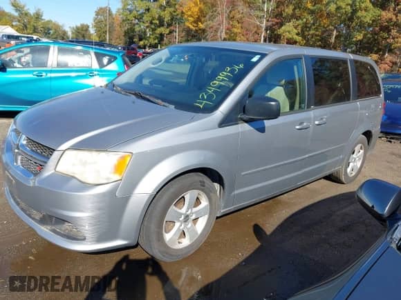 2013 Dodge Grand Caravan SE z VIN 2C4RDGBG0DR761234, wystawiony jako IAAI lot #43499936 z przebiegiem 98 750 mil mil oraz . Historia ofert i sprzedaży dostępna na DreamBid. Obrazek 2.