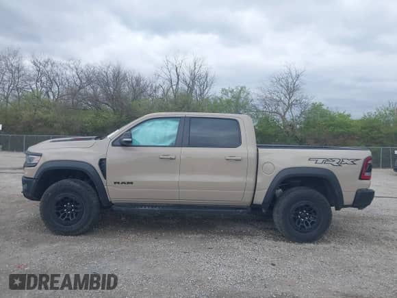 2022 Ram 1500 TRX with VIN 1C6SRFU95NN399791, listed as a IAAI auction lot 42040767 with 38,816 mi miles and . Bid and sale history available at DreamBid. Image 14.