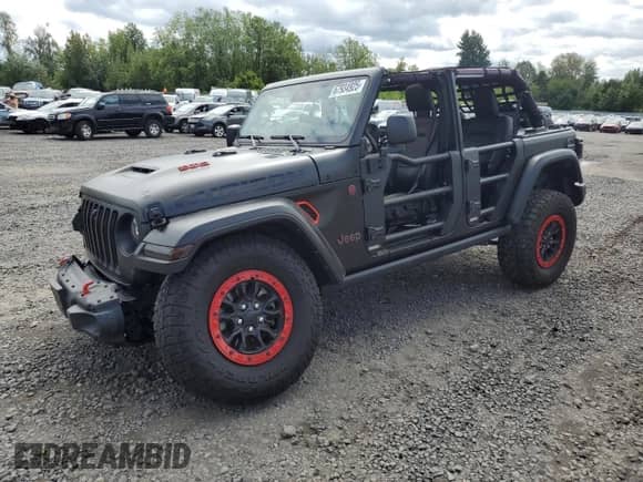 2023 Jeep Wrangler Rubicon 20th Anniversary with VIN 1C4JJXSJ3PW642395, listed as a Copart auction lot 67934925 with 21,587 mi miles and Salvage title. Bid and sale history available at DreamBid. Image 1.