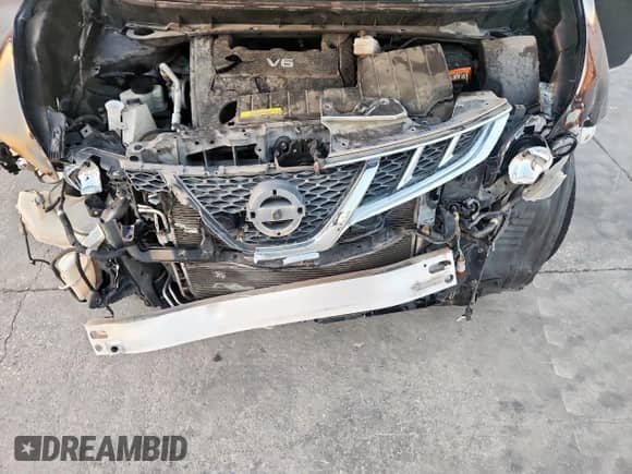 2014 Nissan Murano SV z VIN JN8AZ1MU7EW404791, wystawiony jako Copart lot #81815275 z przebiegiem 100 754 mil mil oraz Szkoda całkowita • Salvage title. Historia ofert i sprzedaży dostępna na DreamBid. Obrazek 12.