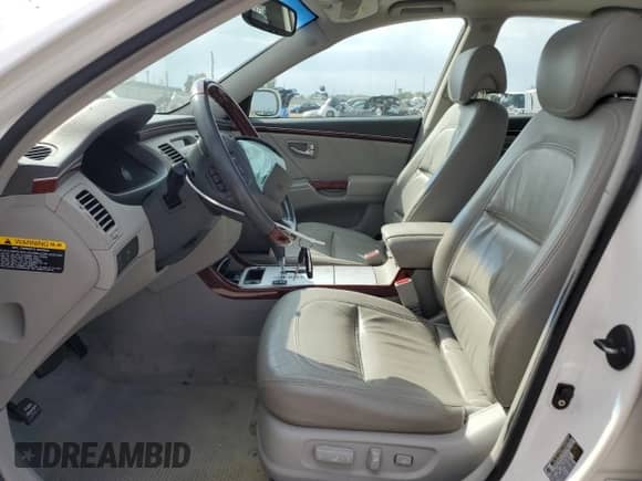 2007 Hyundai Azera SE z VIN KMHFC46F67A209859, wystawiony jako Copart lot #81348945 z przebiegiem 53 960 mil mil oraz Szkoda całkowita • Salvage title. Historia ofert i sprzedaży dostępna na DreamBid. Obrazek 7.