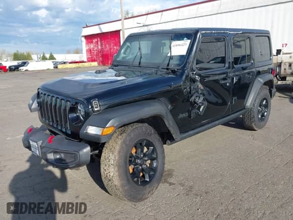 2021 Jeep Wrangler Unlimited Willys with VIN 1C4HJXDM0MW683276, listed as a IAAI auction lot 41896423 with 70,935 mi miles and . Bid and sale history available at DreamBid. Image 2.