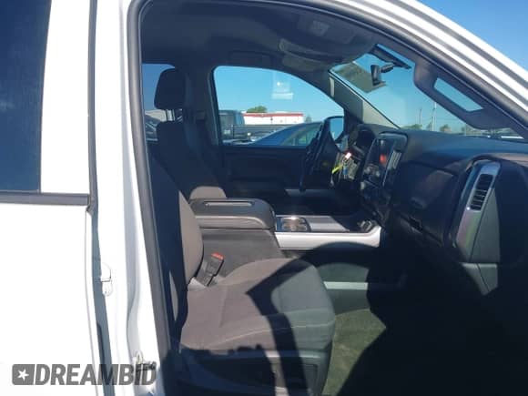 2018 Chevrolet Silverado 1500 LT with VIN 1GCUKRECXJF180945, listed as a IAAI auction lot 42450588 with 108,199 mi miles and . Bid and sale history available at DreamBid. Image 5.