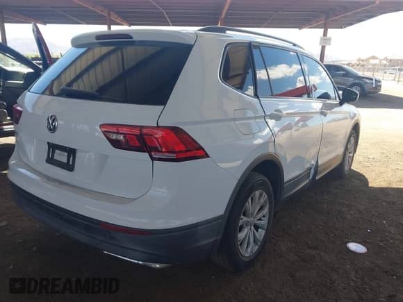 2018 Volkswagen Tiguan S с VIN 3VV1B7AX3JM067887, выставлен на аукционе IAAI как лот 43216100 с пробегом 124 903 миль миль и . История ставок и продаж доступна на DreamBid. Изображение 4.