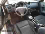 2007 Hyundai Tiburon GS with VIN KMHHM66DX7U246220, listed as a Copart auction lot 53555715 with 105,305 mi miles and Salvage title. Bid and sale history available at DreamBid. Image 8.