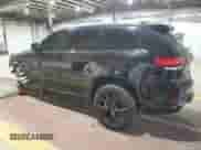 2021 Jeep Grand Cherokee SRT with VIN 1C4RJFDJ7MC543988, listed as a Copart auction lot 55228545 with 84,287 mi miles and Salvage title. Bid and sale history available at DreamBid. Image 2.