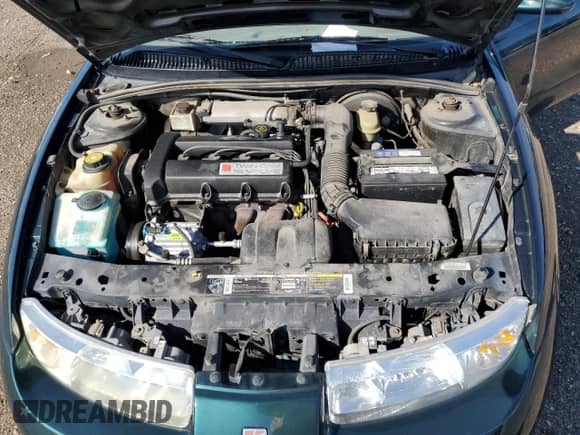 1998 Saturn SC with VIN 1G8ZH1278WZ280085, listed as a Copart auction lot 62767845 with 95,915 mi miles and Salvage title. Bid and sale history available at DreamBid. Image 11.