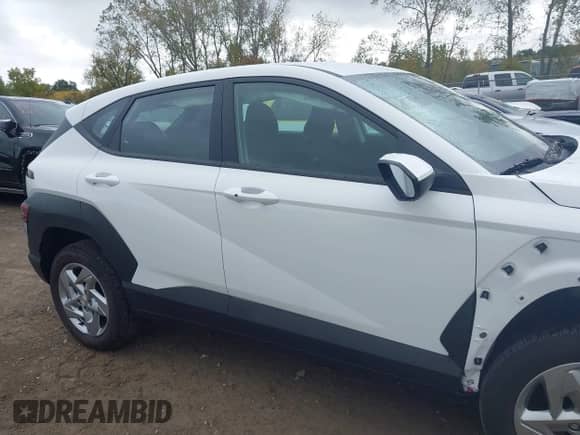 2025 Hyundai Kona SE with VIN KM8HACAB0SU301571, listed as a IAAI auction lot 43377717 with 5,761 mi miles and . Bid and sale history available at DreamBid. Image 13.